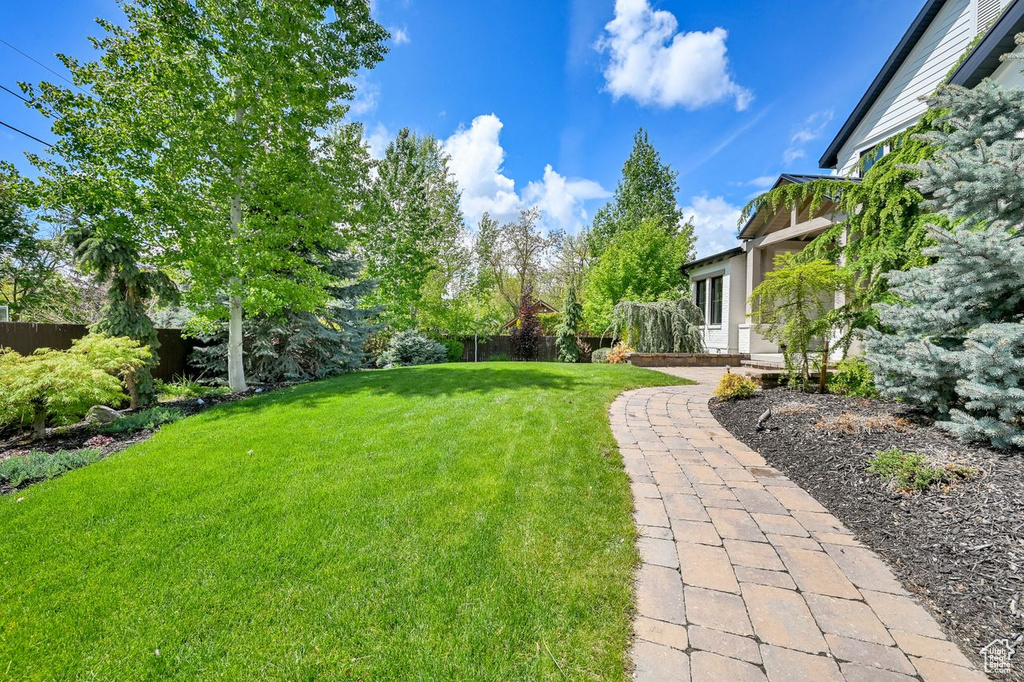 View of yard with fence