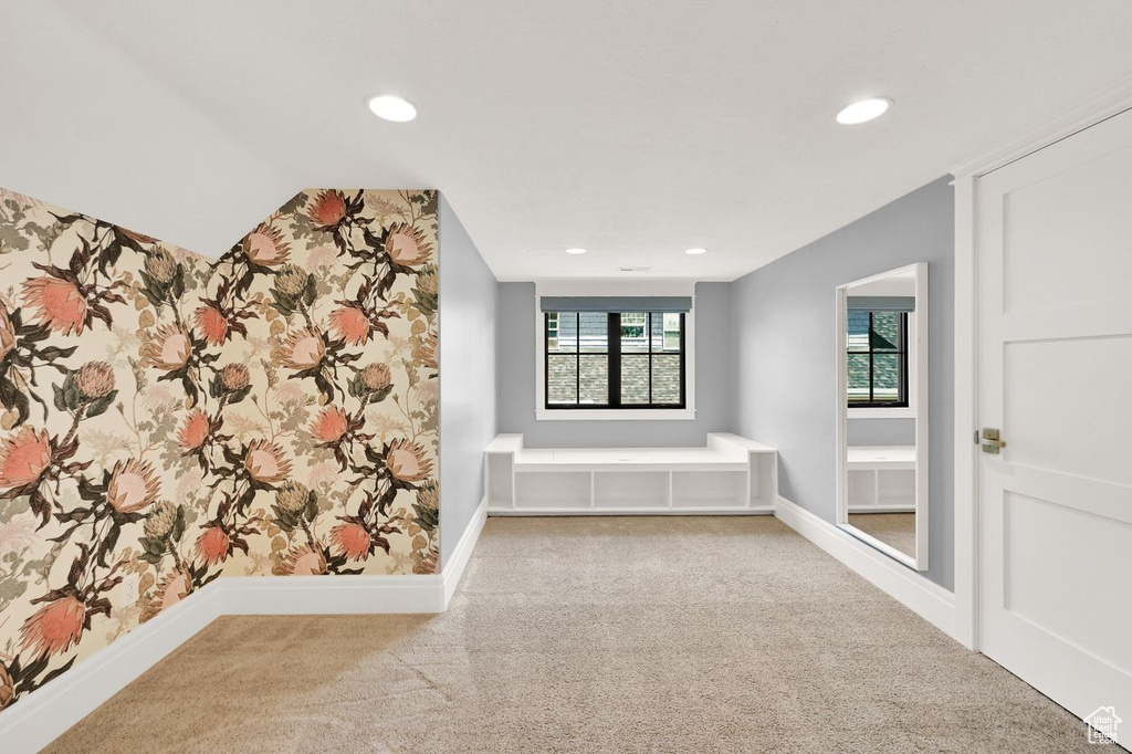 Interior space featuring carpet floors, recessed lighting, and baseboards