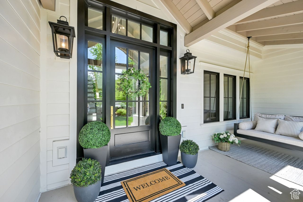 Entrance to property with covered porch