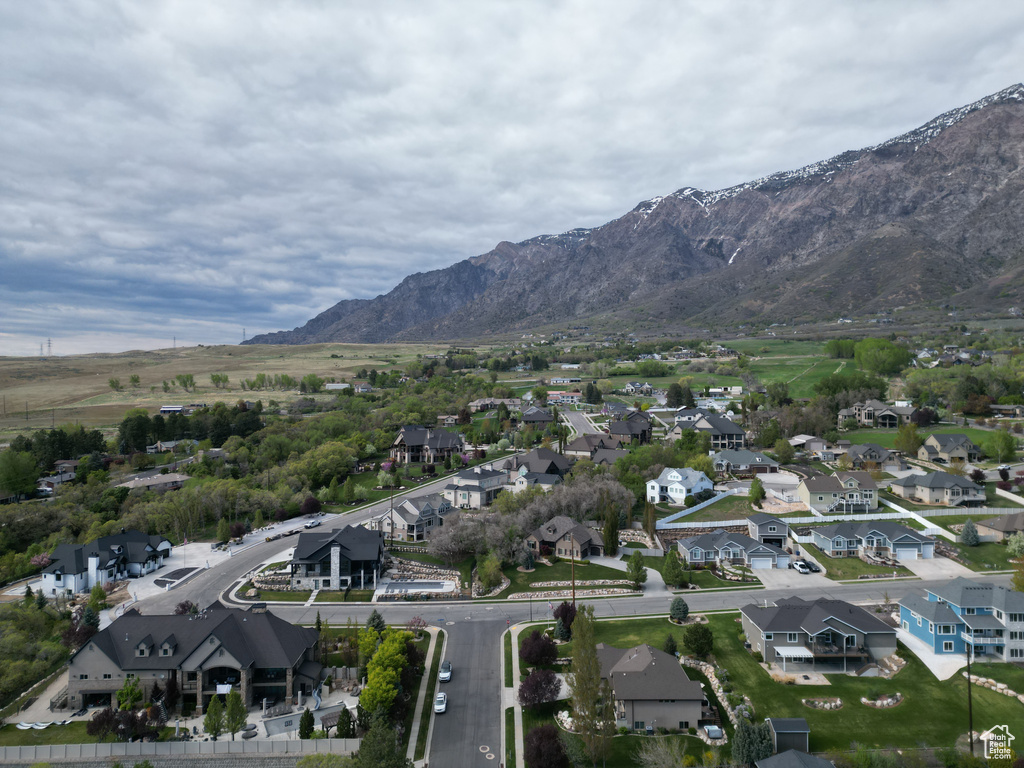 Drone / aerial view featuring a mountain view and a residential view
