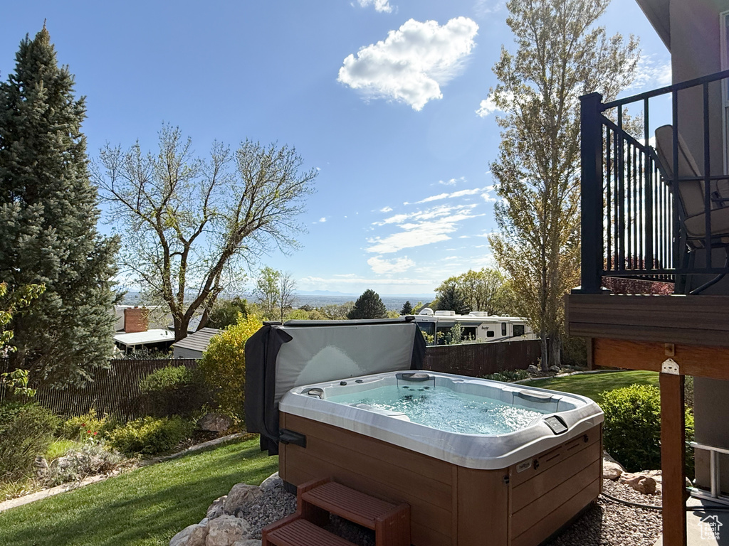 Exterior space featuring a hot tub