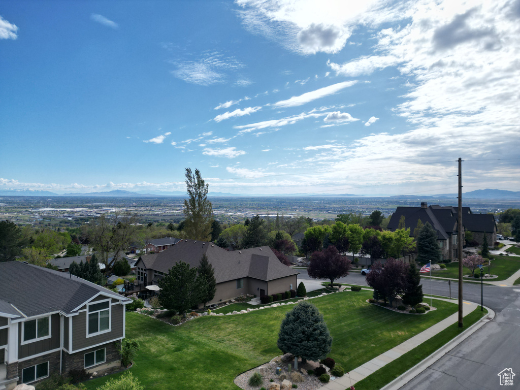 Aerial view featuring a residential view and a mountain view