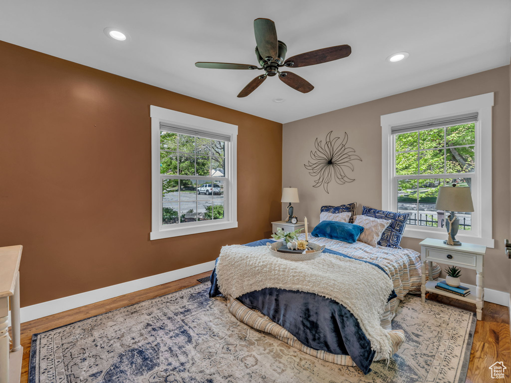 Bedroom with baseboards, a ceiling fan, recessed lighting, and wood finished floors