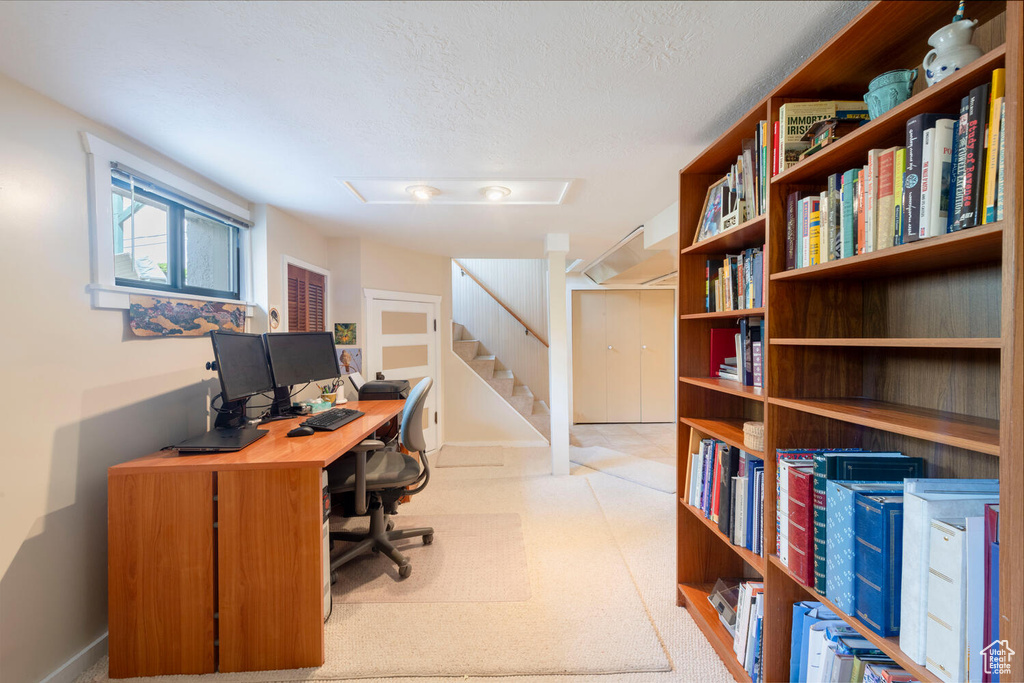 Office with a textured ceiling