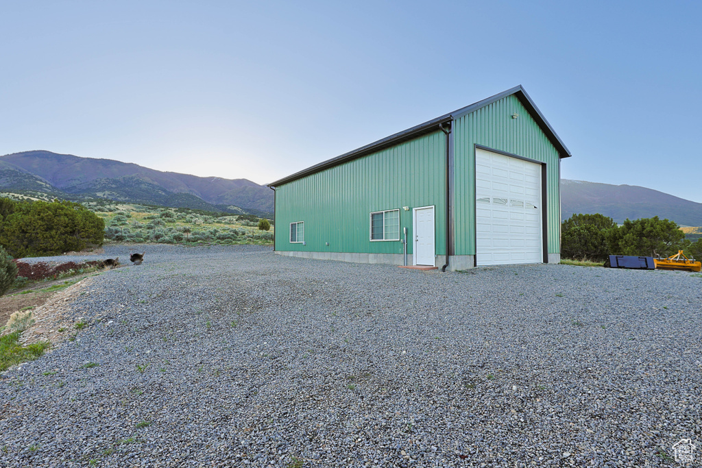 View of outbuilding featuring an outbuilding and a mountain view