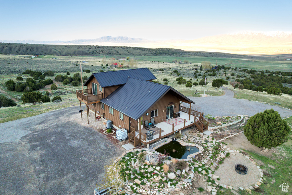 Drone / aerial view featuring a mountain view and a rural view