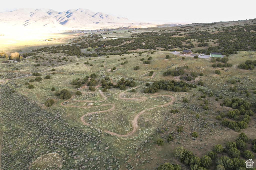 Birds eye view of property featuring a rural view, a mountain view, and view of desert
