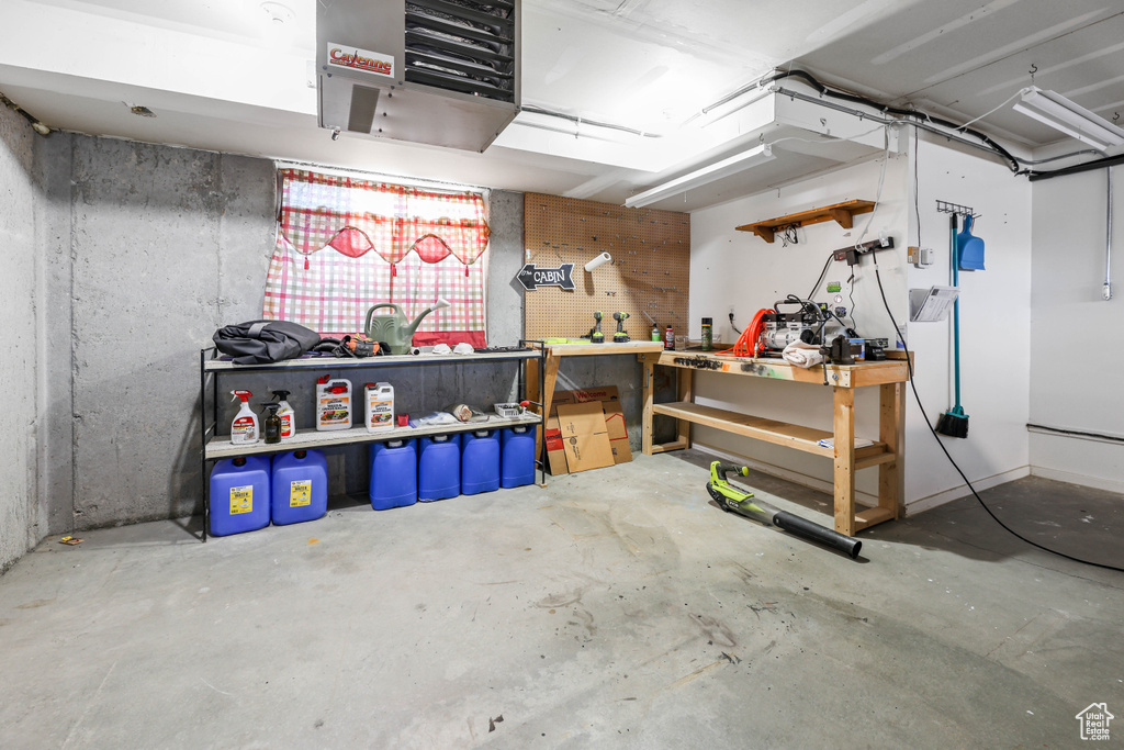 Garage featuring a workshop area