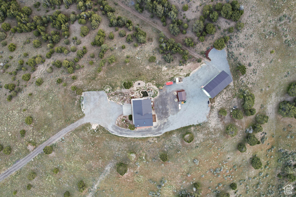 Birds eye view of property with a desert view