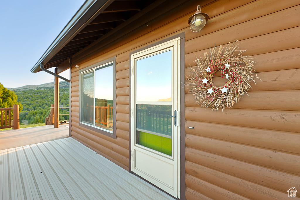 Exterior space with log veneer siding