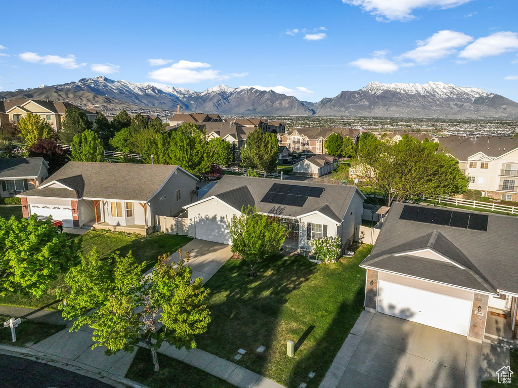Drone / aerial view with a residential view and a mountain view