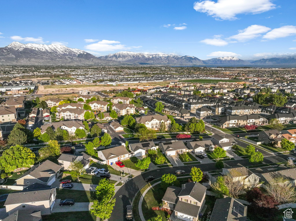 Drone / aerial view with a residential view and a mountain view