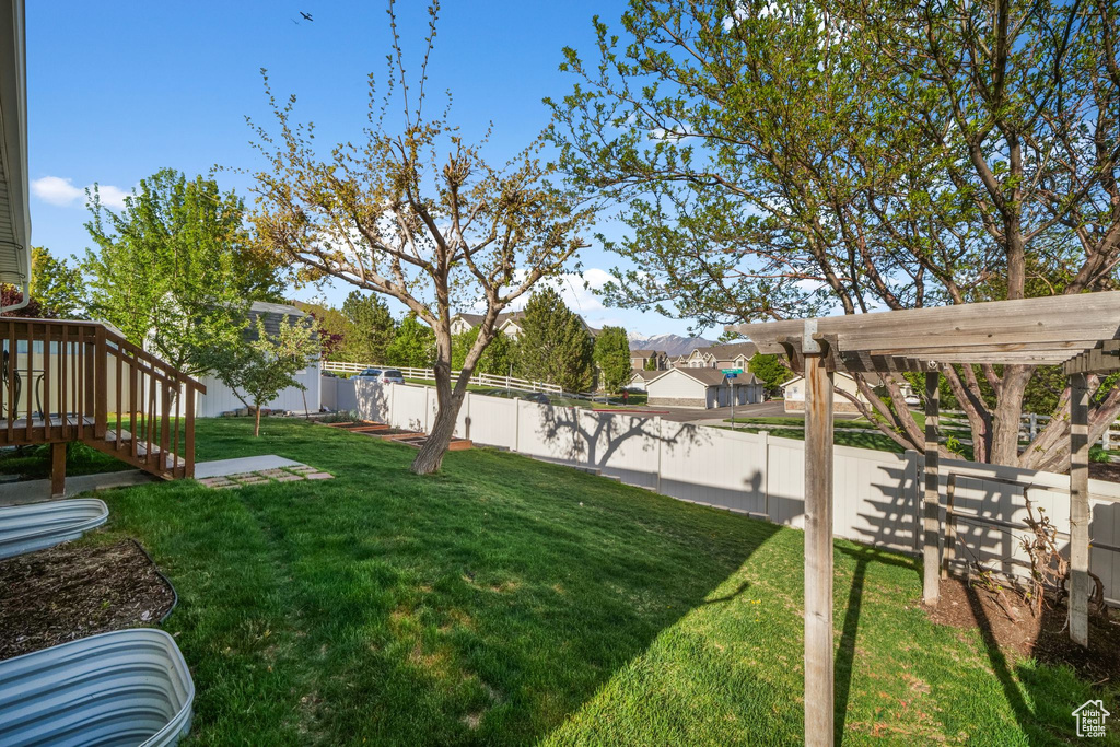 View of yard with a fenced backyard