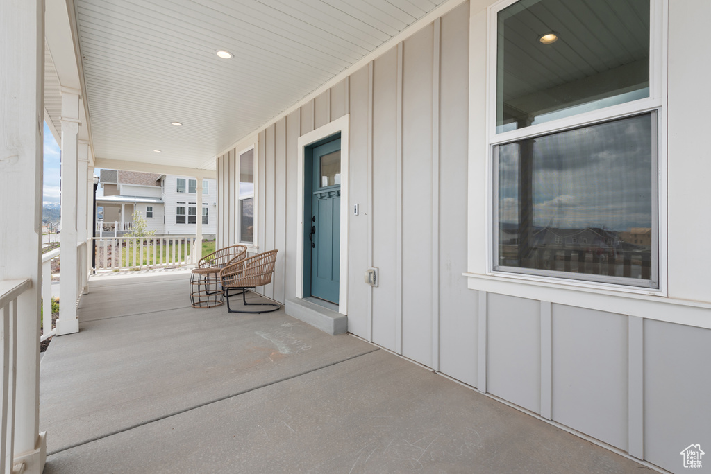 View of patio with a porch