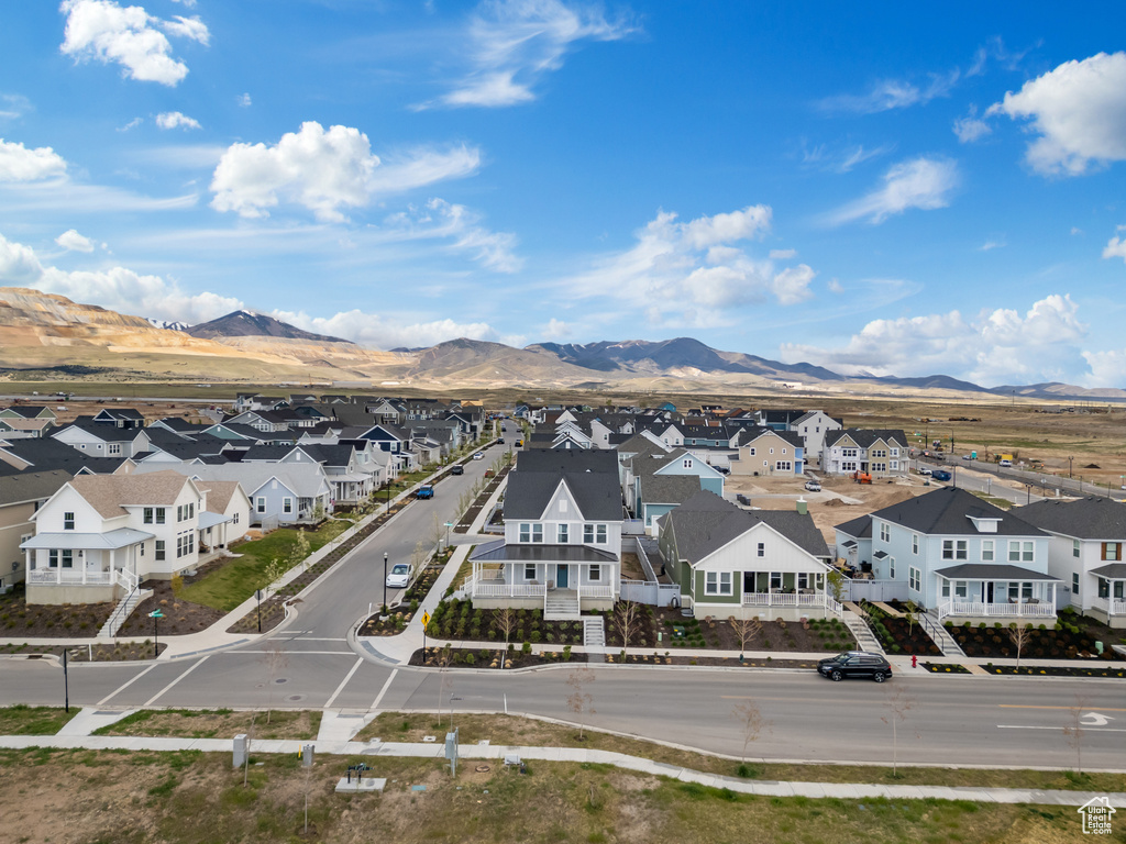 Drone / aerial view with a residential view and a mountain view