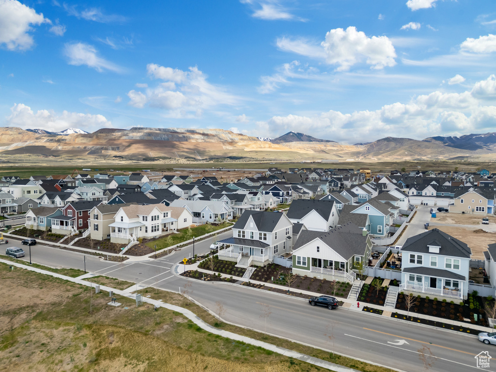 Birds eye view of property featuring a mountain view and a residential view