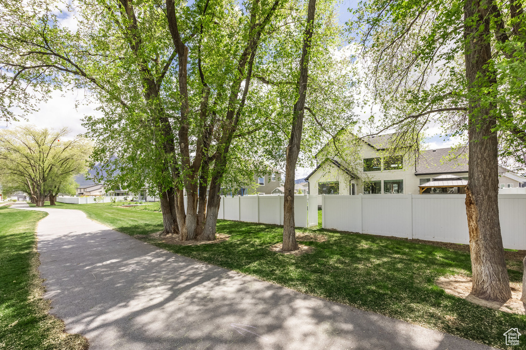 View of yard featuring fence