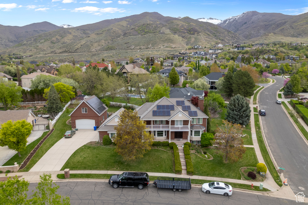 Drone / aerial view featuring a mountain view and a residential view
