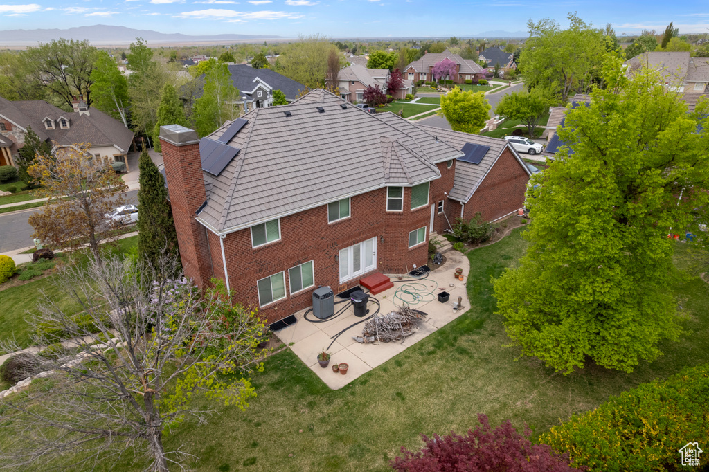 Birds eye view of property with a residential view