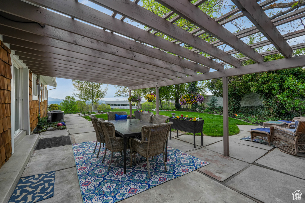 View of patio / terrace with outdoor dining space, a pergola, a fenced backyard, cooling unit, and an outdoor living space