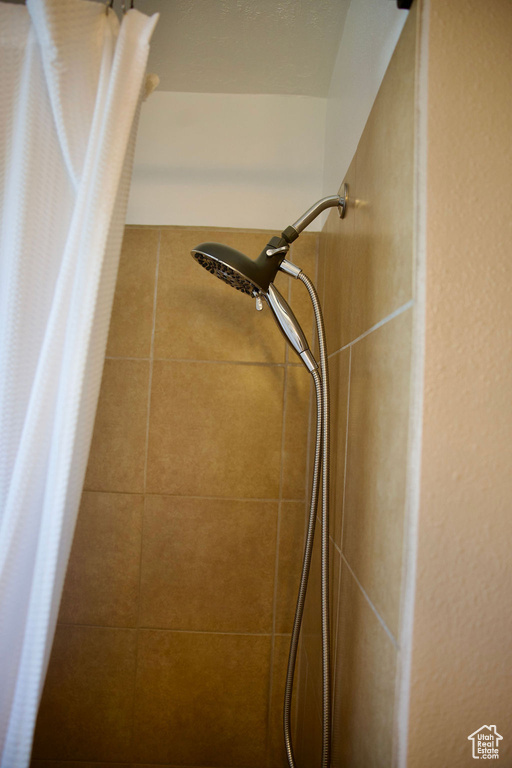 Interior details with a tile shower