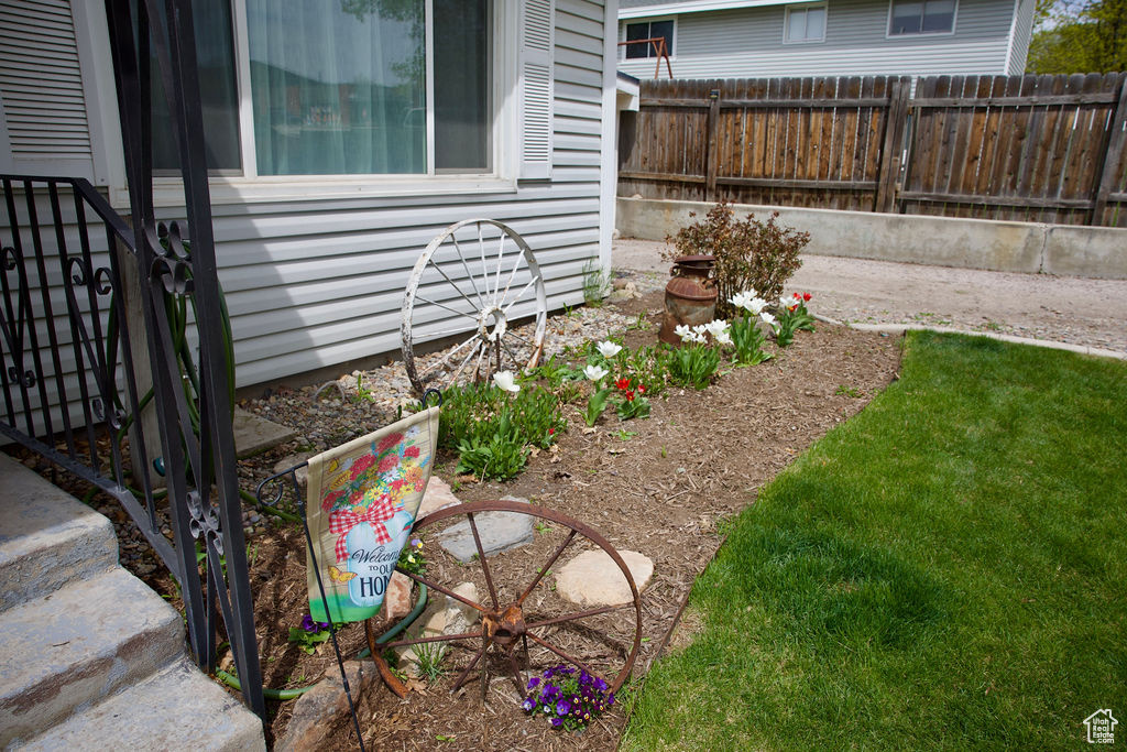View of yard with fence