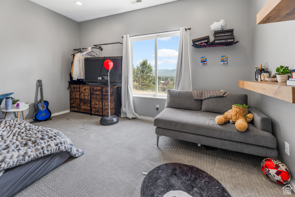 Carpeted bedroom with recessed lighting, baseboards, and visible vents