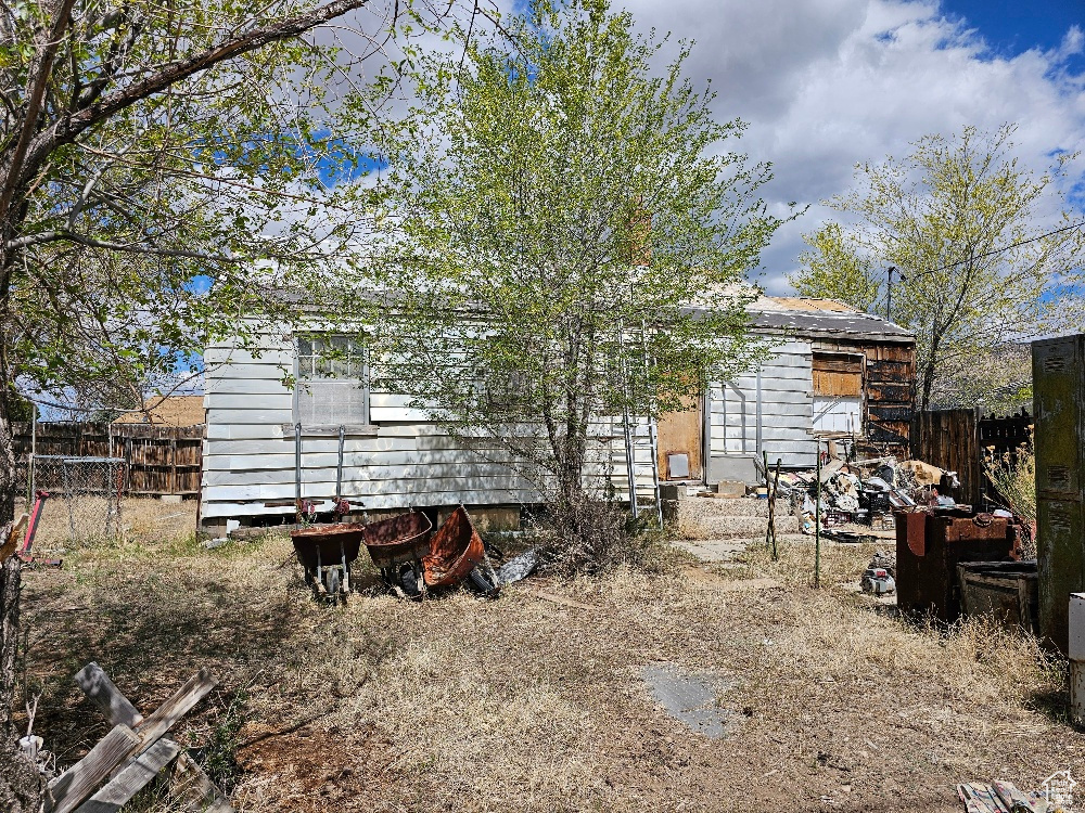 View of yard with fence