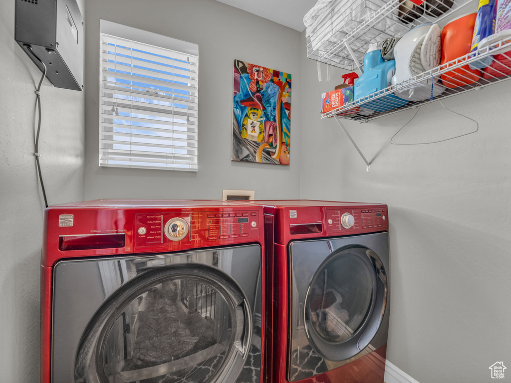 Laundry room featuring laundry area and washing machine and clothes dryer