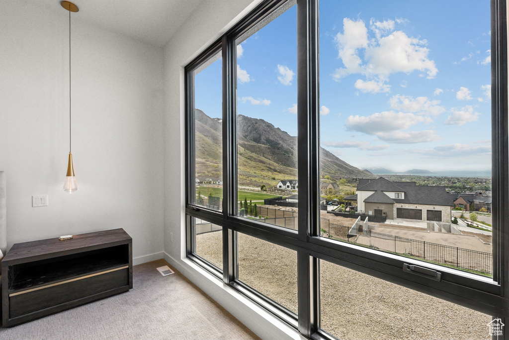 Interior space featuring visible vents and a mountain view