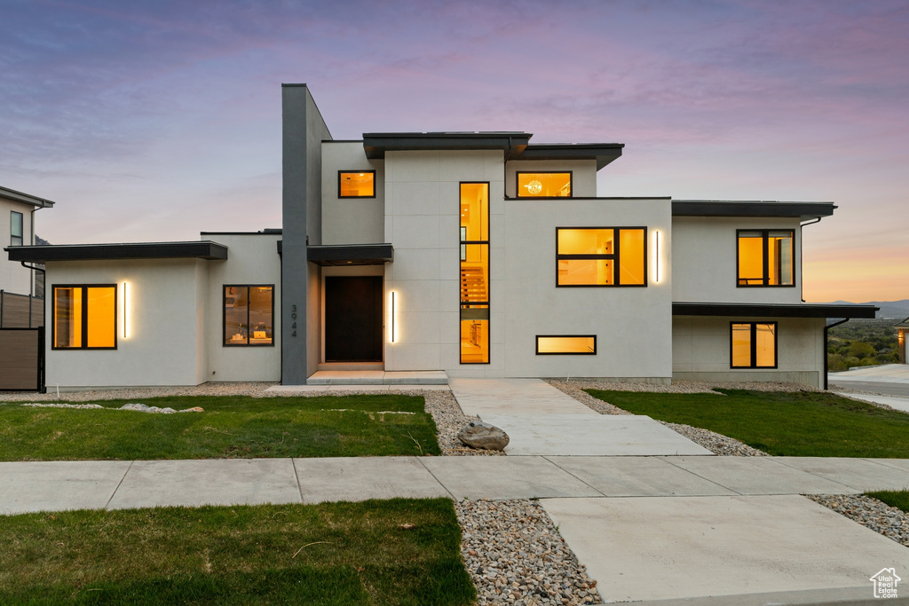 Contemporary home with a lawn