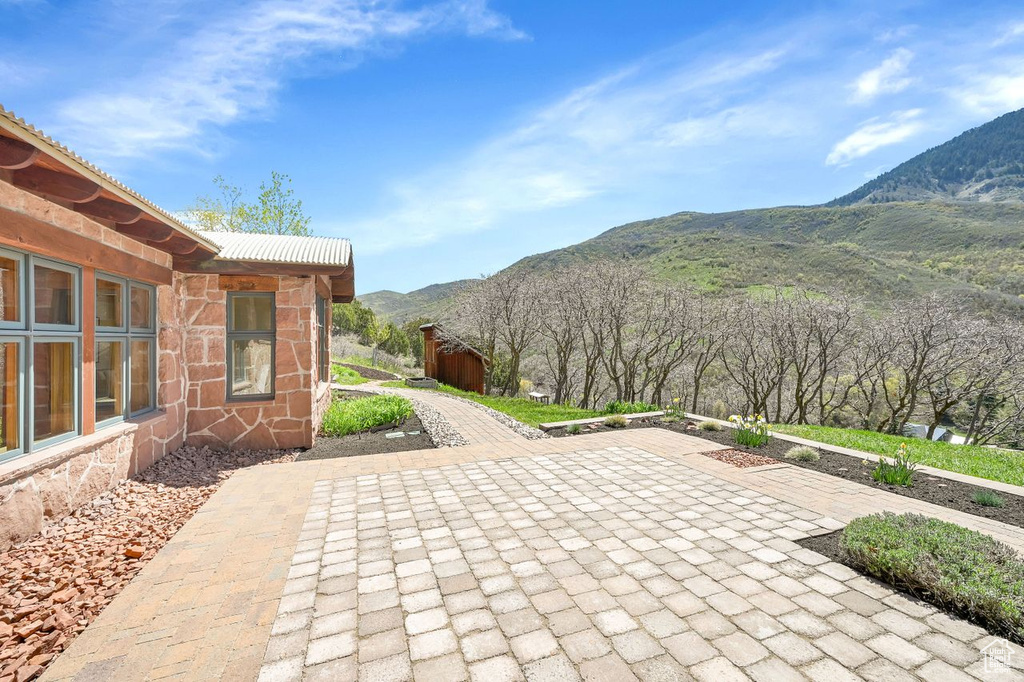 View of patio with a mountain view