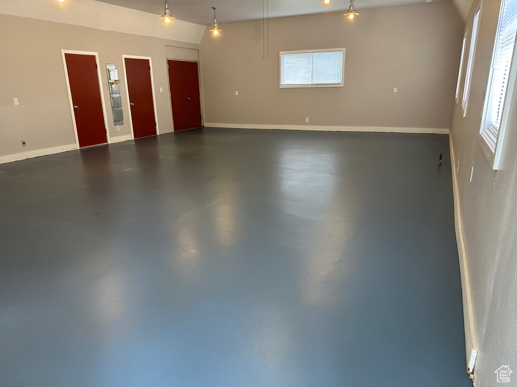 Garage featuring baseboards