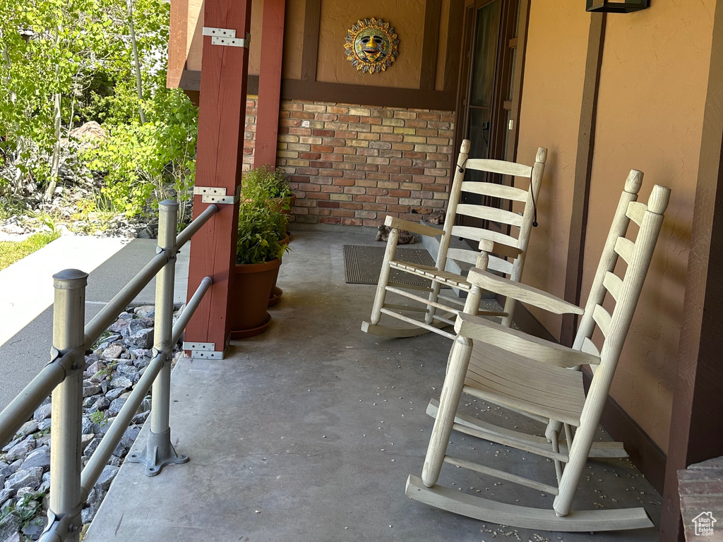 View of patio featuring a porch