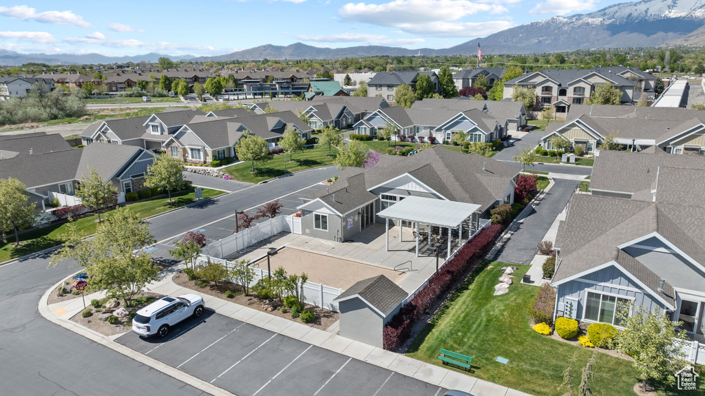 Drone / aerial view featuring a mountain view and a residential view