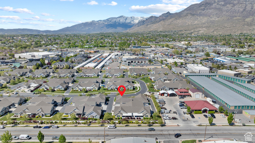Birds eye view of property featuring a residential view and a mountain view