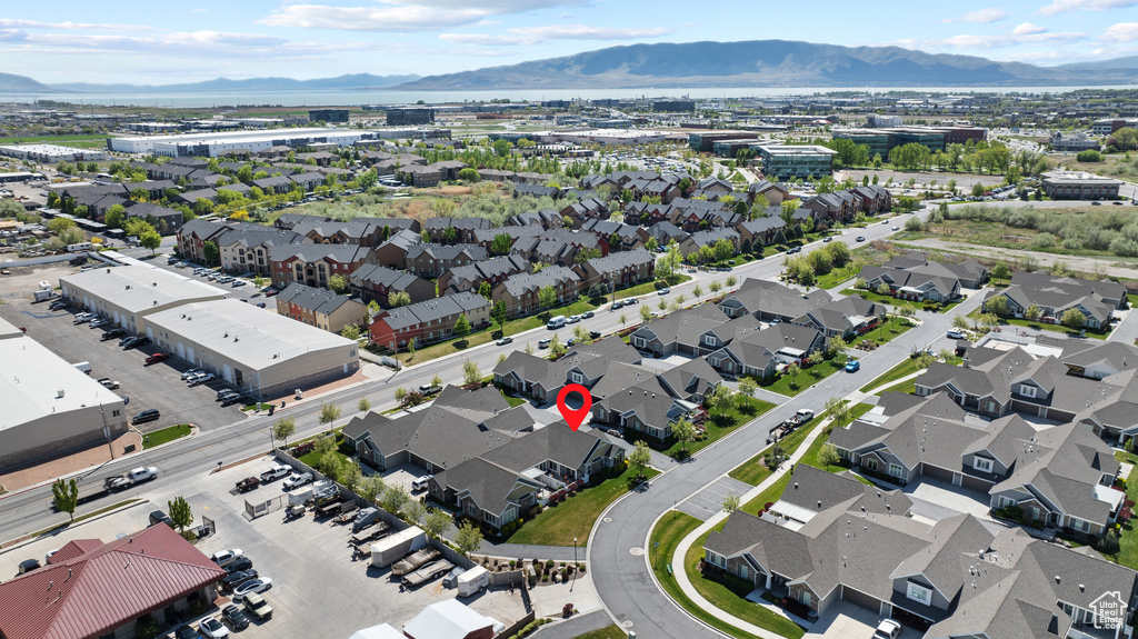 Birds eye view of property featuring a residential view and a mountain view