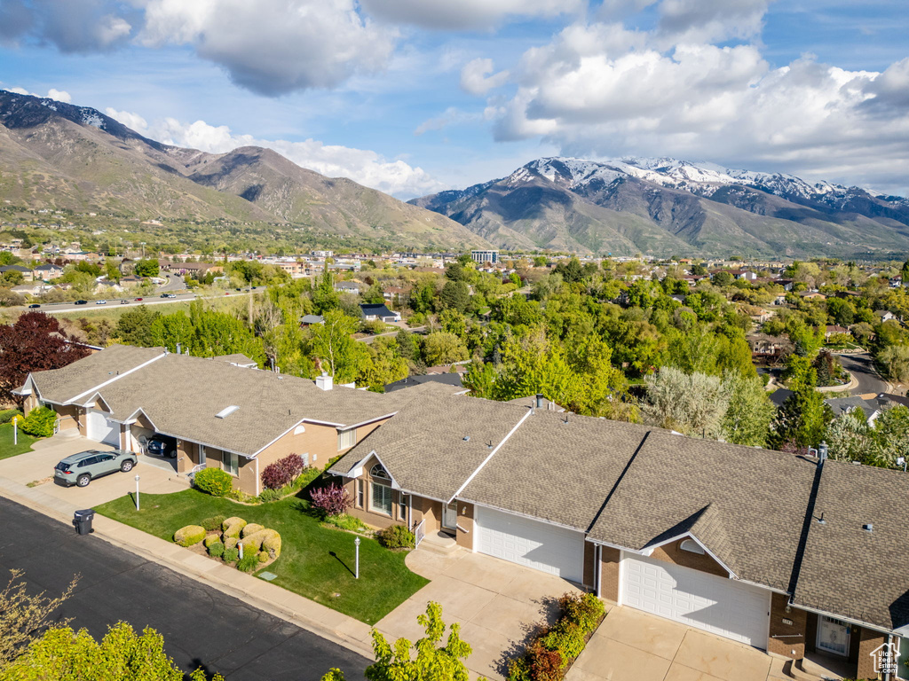 Birds eye view of property featuring a residential view and a mountain view