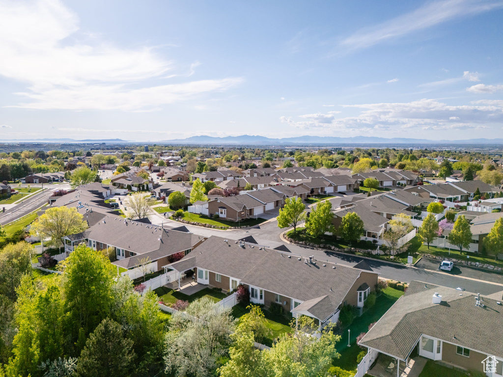 Drone / aerial view with a residential view and a mountain view