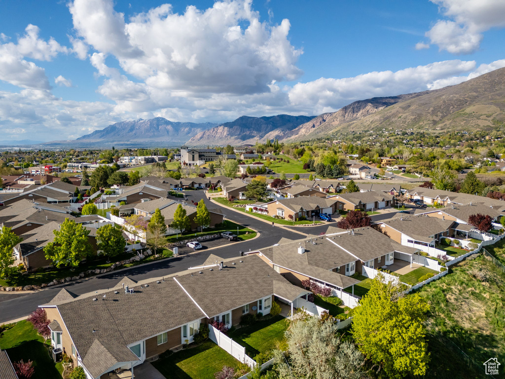 Birds eye view of property featuring a residential view and a mountain view