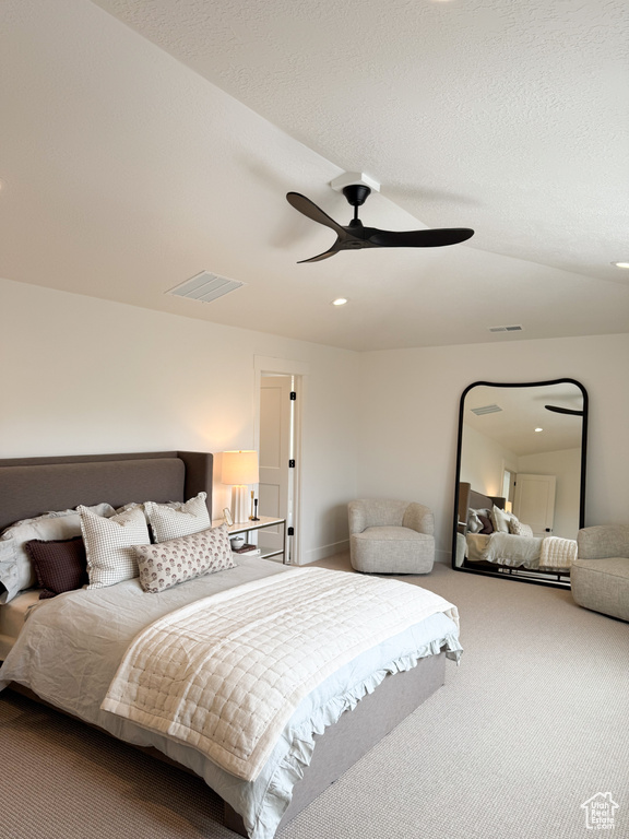 Bedroom featuring carpet floors, ceiling fan, recessed lighting, and visible vents