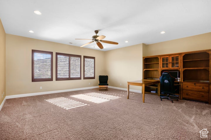 Office featuring carpet flooring, recessed lighting, ceiling fan, and baseboards