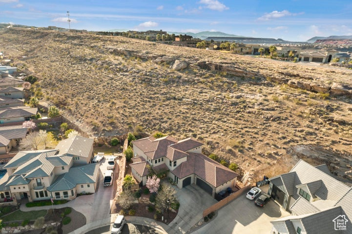 Aerial view featuring a mountain view and a residential view