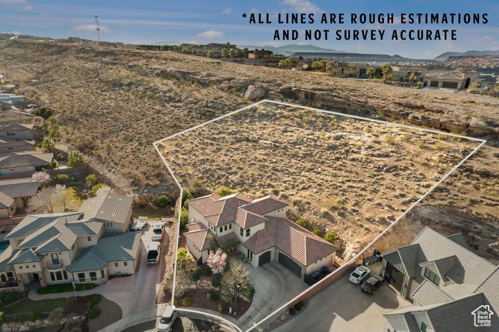 Bird's eye view with a desert view and a residential view
