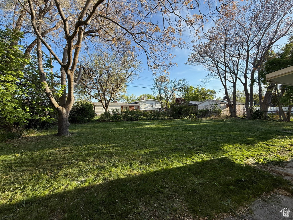 View of yard with fence