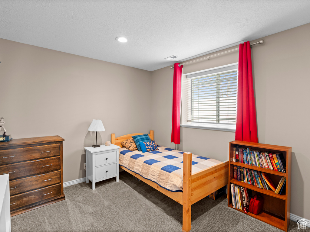 Bedroom with baseboards, carpet flooring, visible vents, and recessed lighting