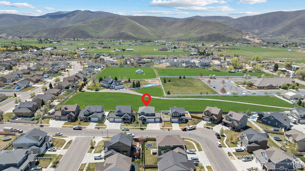 Drone / aerial view featuring a mountain view and a residential view
