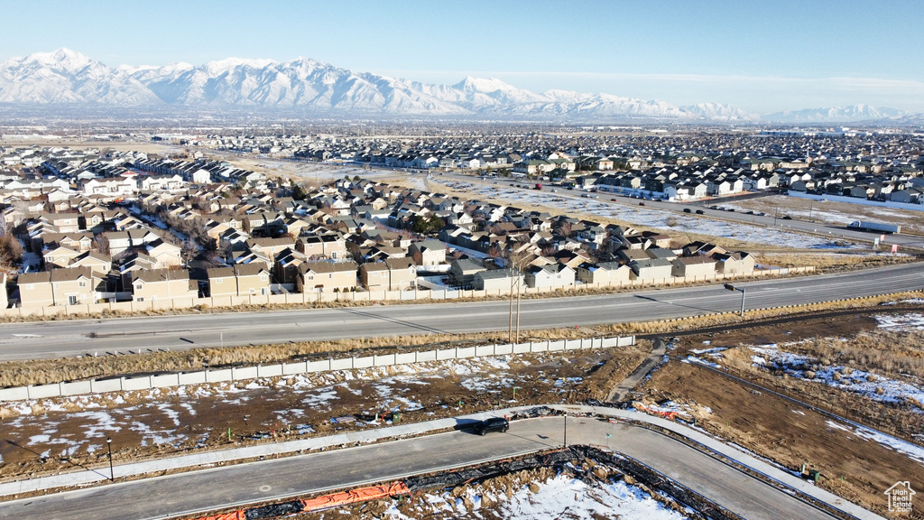 Drone / aerial view with a residential view and a mountain view