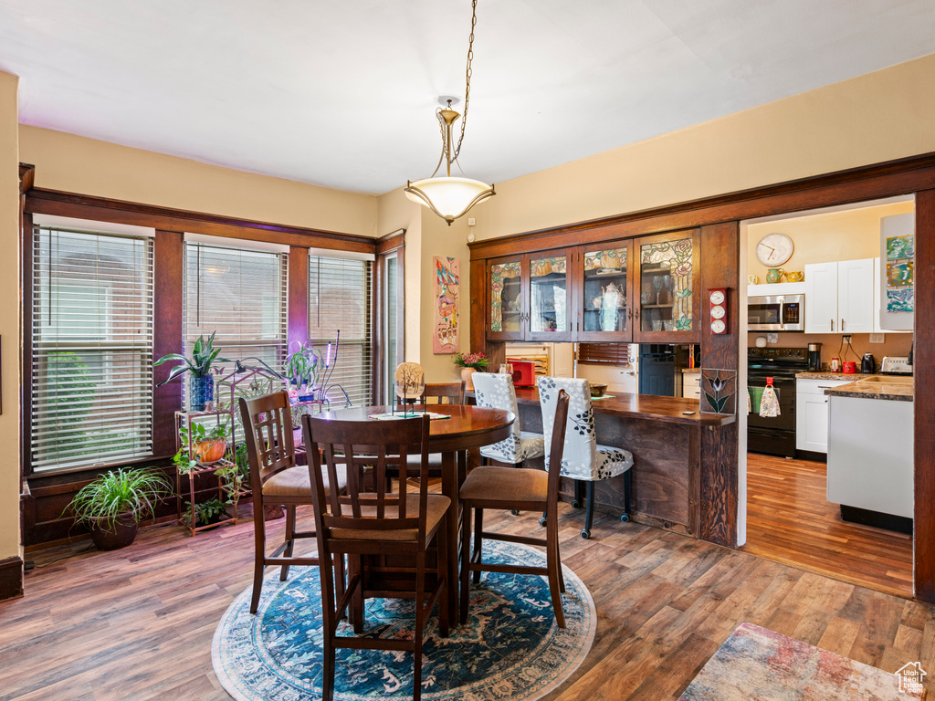 Dining room with wood finished floors