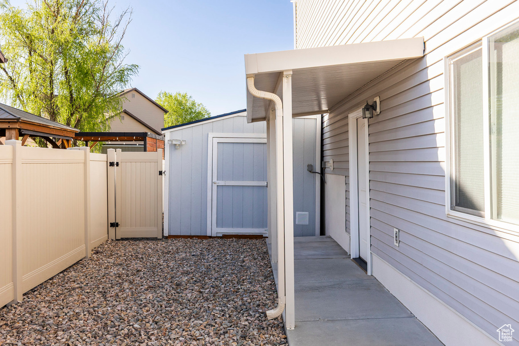 Exterior space featuring fence and a gate